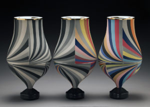 Peter Pincus (American, b. 1982), Trio of Vessels IV, 2016; colored porcelain with luster; 18 x 30 x 10 in. Collection Daum Museum of Contemporary Art, museum purchase.