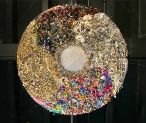 C. Finley, "Junk Jewelry Mandala," 2027; mixed media. Courtesy of the artist.