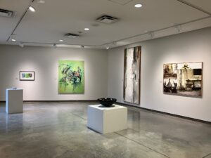 Installation shot of "Bones, Blooms, and Biomes"