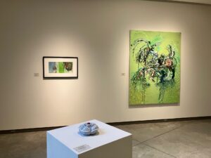 Installation shot of "Bones, Blooms, and Biomes"