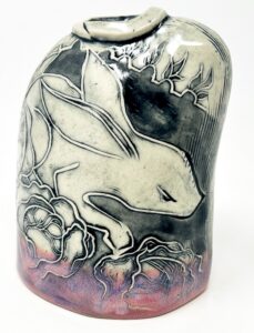 Steph Kates, "The Hare and the Hedgehog", 2025; linoleum block relief on ceramic; courtesy of the artist.