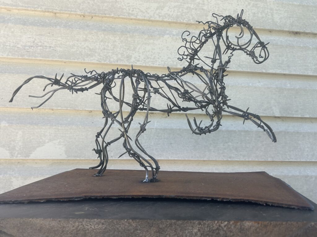 Glory Hartsfield, "Freedom", 2026; Barb wire, tie wire, and steel; Courtesy of the artist.